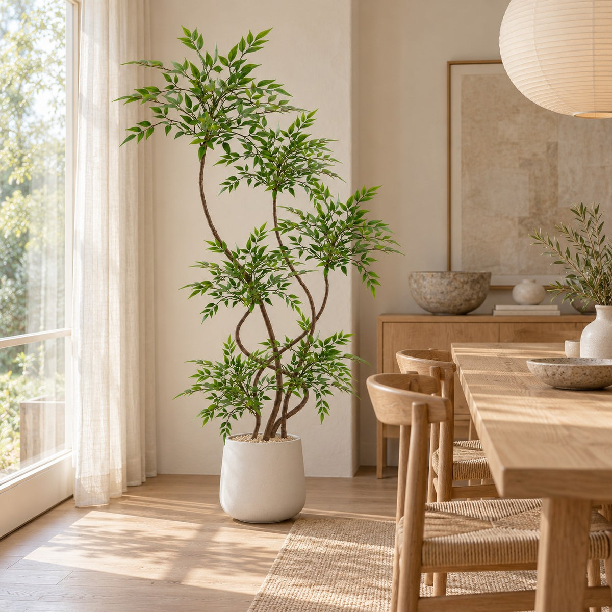 Artificial Nandina Tree in a white round planter, styled in a real home