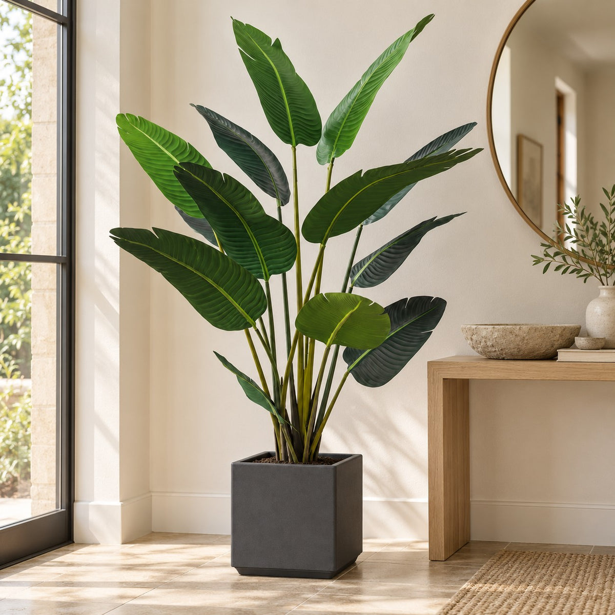 Artificial Traveller's Palm in a grey square planter, styled in a real home