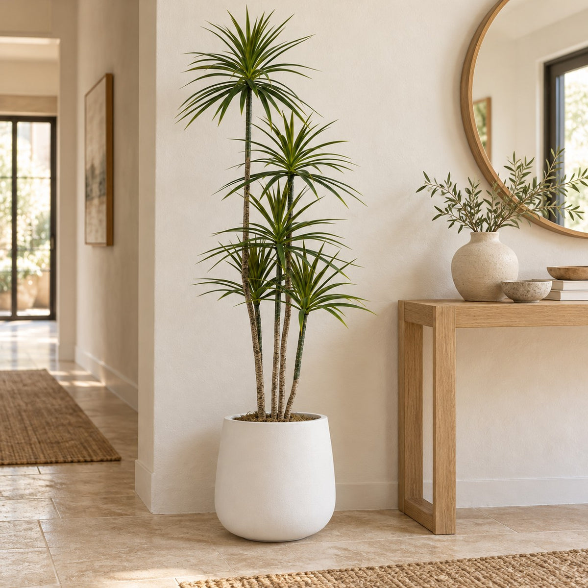 White Round Planter with an artificial plant, styled in a real home